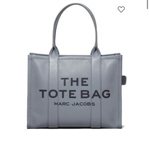 Marc Jacobs
The Large Tote bag-Grey***brand new never used****genuine leather